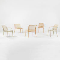 Set of five chairs featuring light beige and natural wood tones with woven patterns and minimalist design.