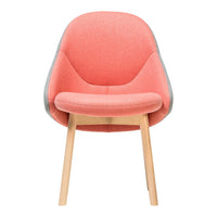 Pink upholstered chair with a soft, sleek design and wooden legs, featuring a smooth gray accent.