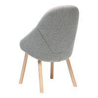 "Light gray upholstered chair with soft contours and natural wood legs, perfect for modern interiors."