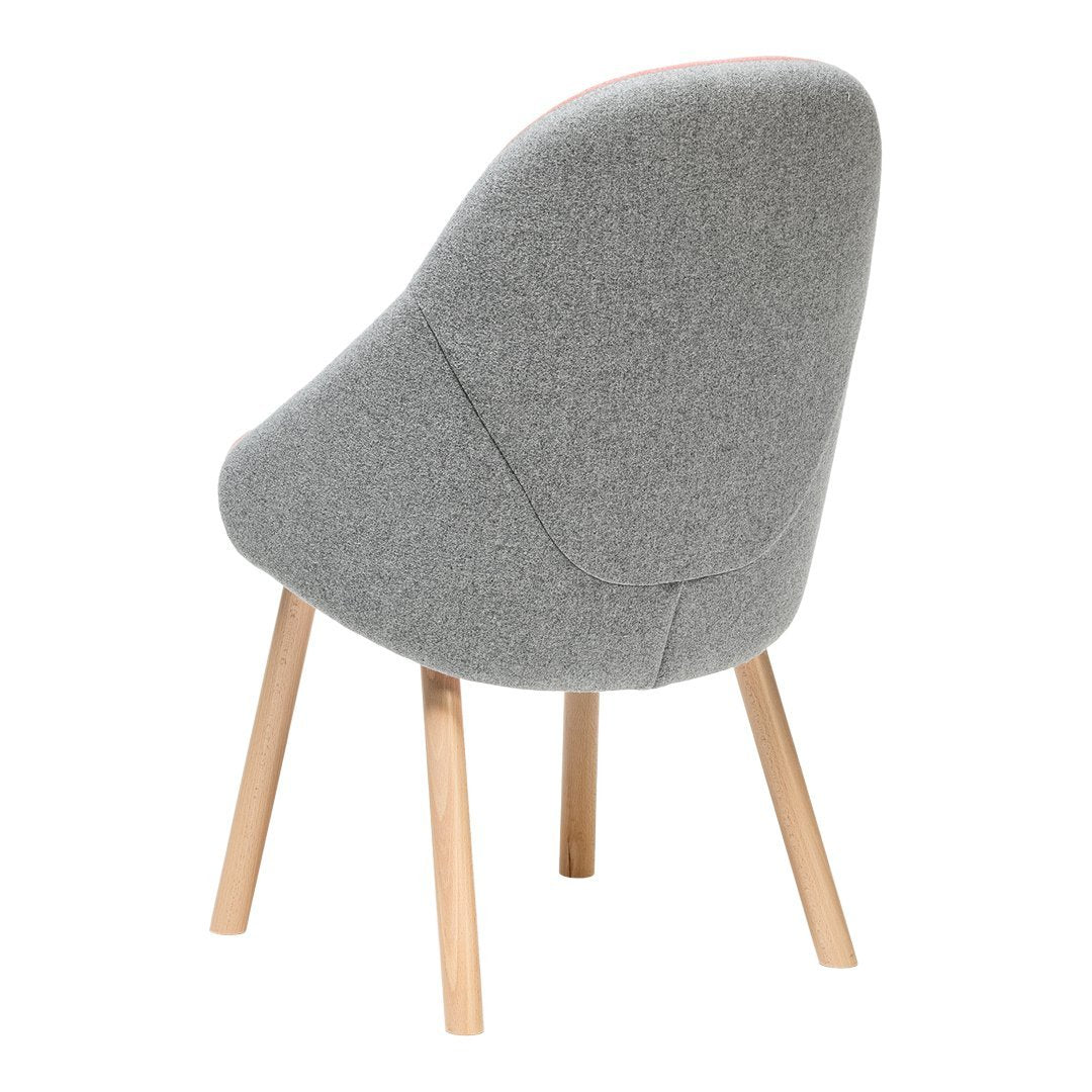 Gray upholstered chair with a sleek design, featuring wooden legs and a smooth, textured finish.