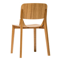 Natural wood chair with light brown finish and smooth, minimalist design. Simple, modern aesthetic for any space.