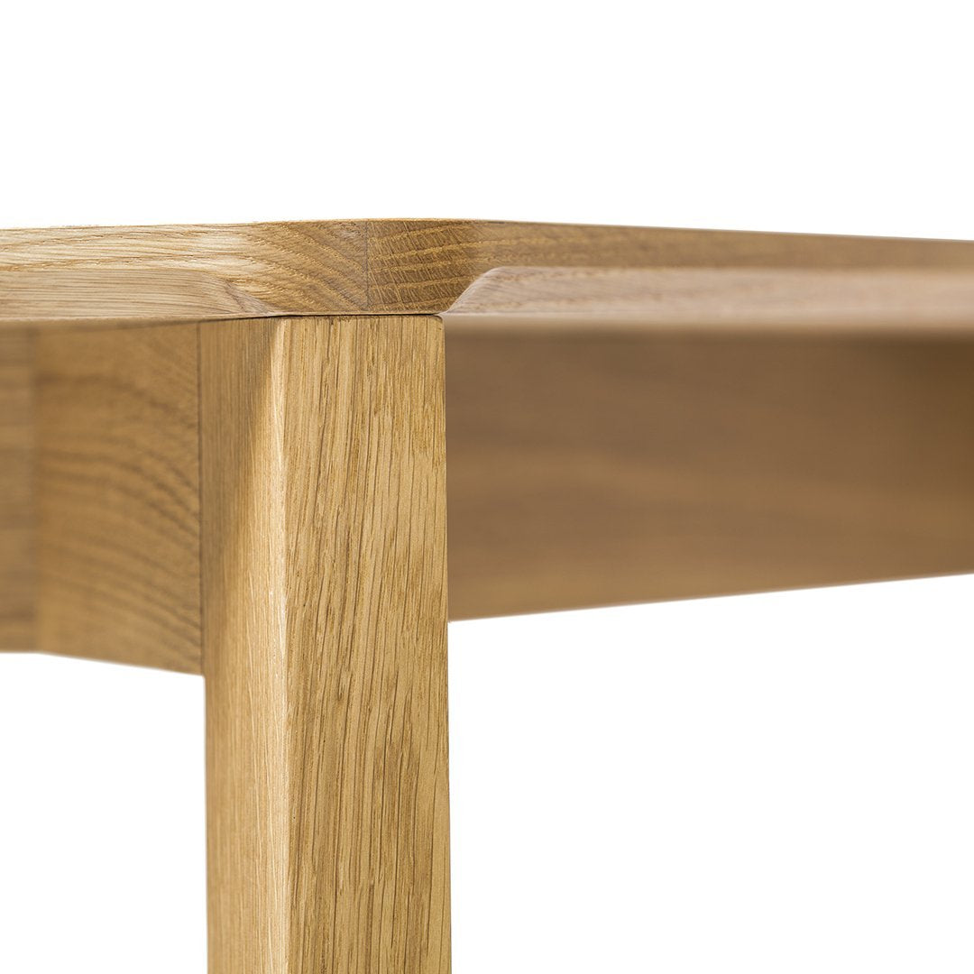 Close-up of light oak wood grain with natural pattern, showcasing smooth edges and warm tones.