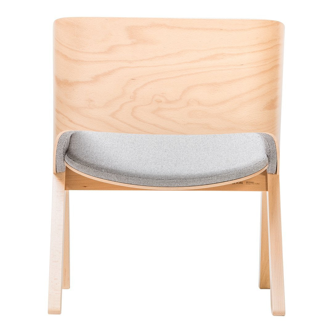 Light wood chair with a smooth, natural finish and a soft gray upholstered seat, featuring a minimalist design.