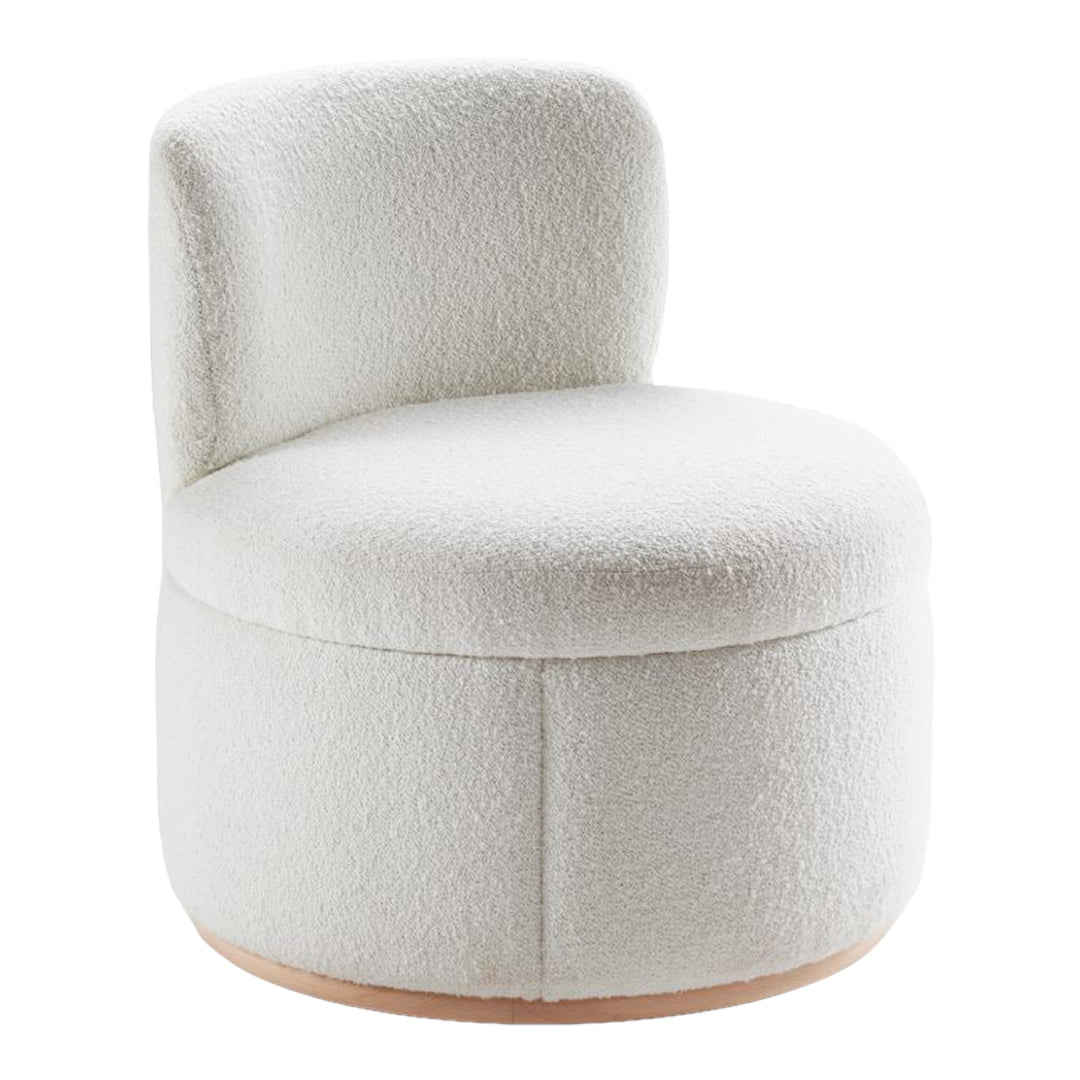 Cozy white boucle accent chair with smooth, rounded shapes and a warm wooden base. Ideal for modern decor.