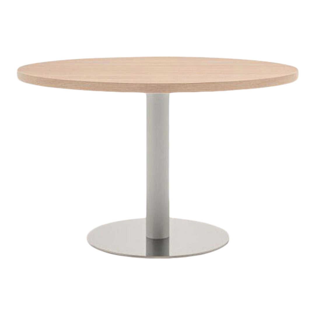Round wooden tabletop in light beige with a sleek silver pedestal base, offering a modern and minimalist design.