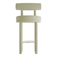 Light beige upholstered bar stool with a simple, modern design and circular patterns.