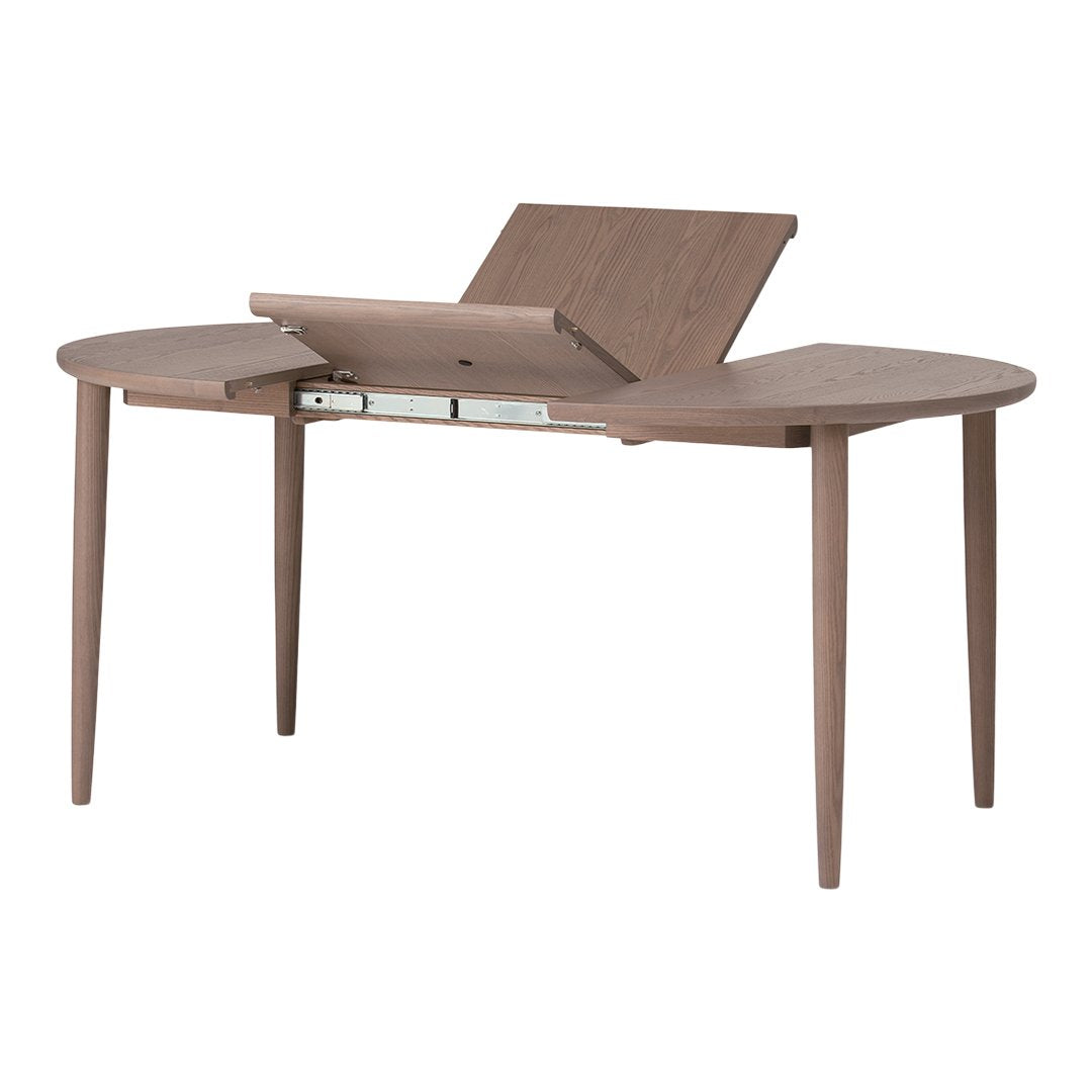 Brown wooden desk with a smooth finish and minimalist design, featuring a unique foldable top and tapered legs.