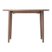 Light brown wooden table with sleek, minimalistic design and smooth surface. Ideal for modern decor.