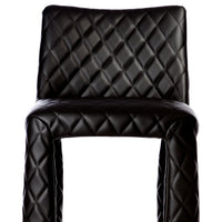 Black quilted bar stool featuring a textured diamond pattern for a modern, stylish look.