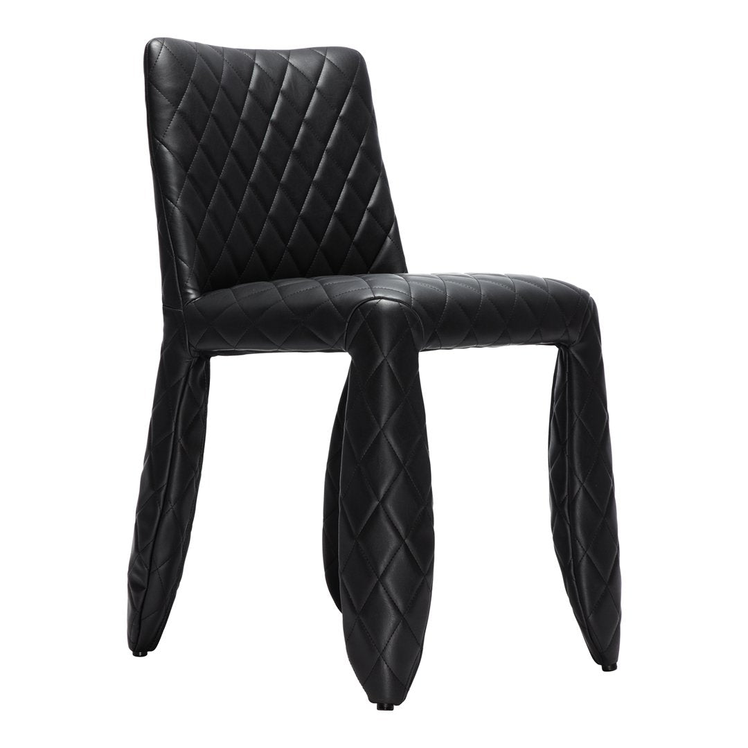 Black quilted dining chair with a sleek design and diamond-patterned upholstery. Perfect for modern interiors.