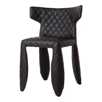 Black upholstered chair with a diamond quilted pattern and unique, curved legs. Perfect for modern decor.