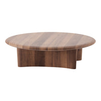 Round wooden serving platter with rich, dark walnut color and subtle stripes, showcasing natural grain patterns.