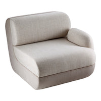 Beige upholstered chair with a smooth, textured surface and subtle ribbed detailing on the base.