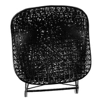 "Black woven chair with intricate geometric patterns, featuring a modern design and sleek lines."