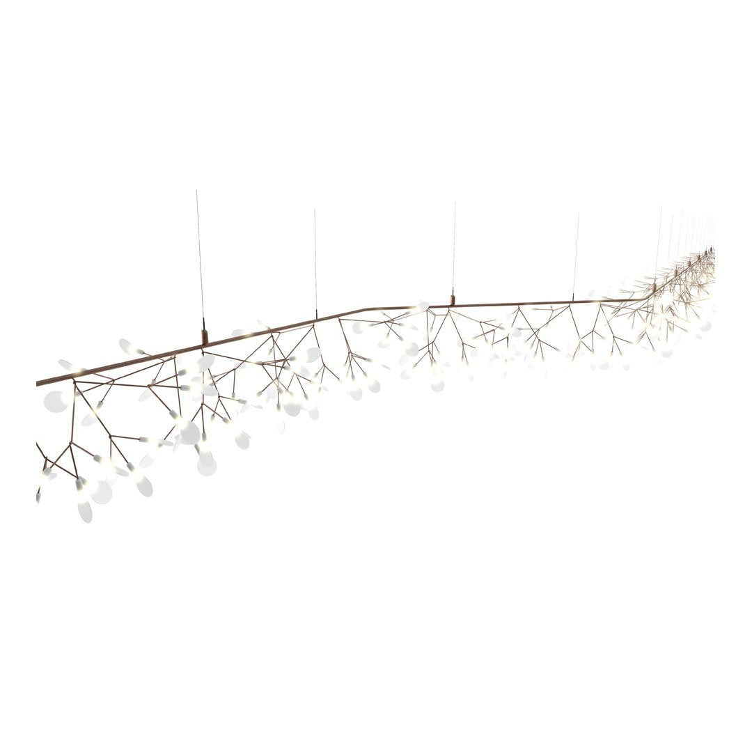 Elegant mobile featuring soft white discs on delicate, branching rods in a minimalist design against a white background.