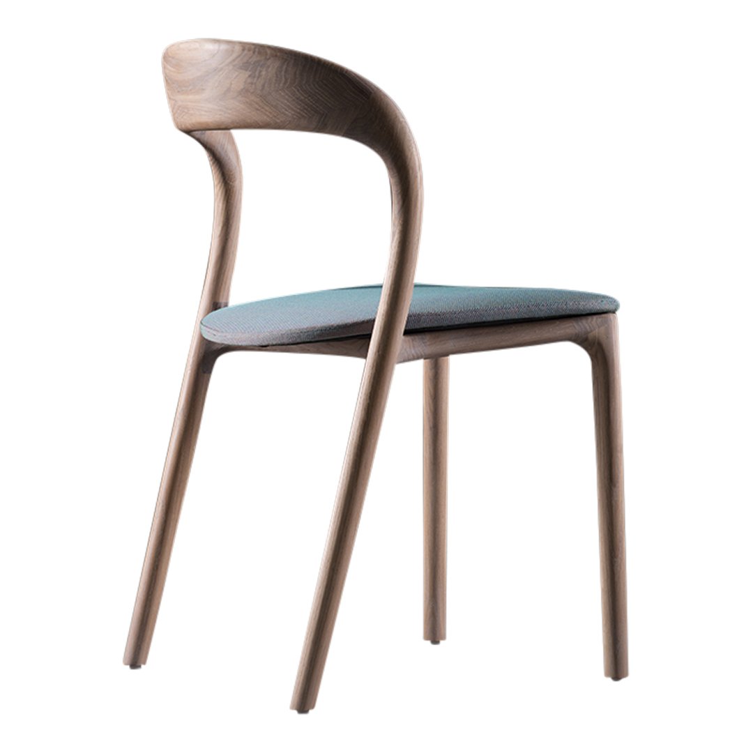 Wooden chair with a curved back, featuring a smooth walnut finish and a soft, light blue upholstery.