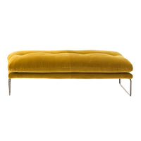 Velvet ottoman in rich mustard yellow with tufted design and sleek metal legs. Perfect for modern home decor.