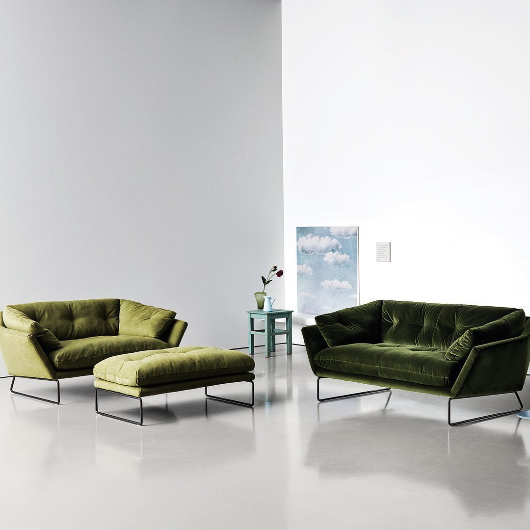 Green velvet sofa set featuring a modern design and sleek metal legs, perfect for stylish living spaces.