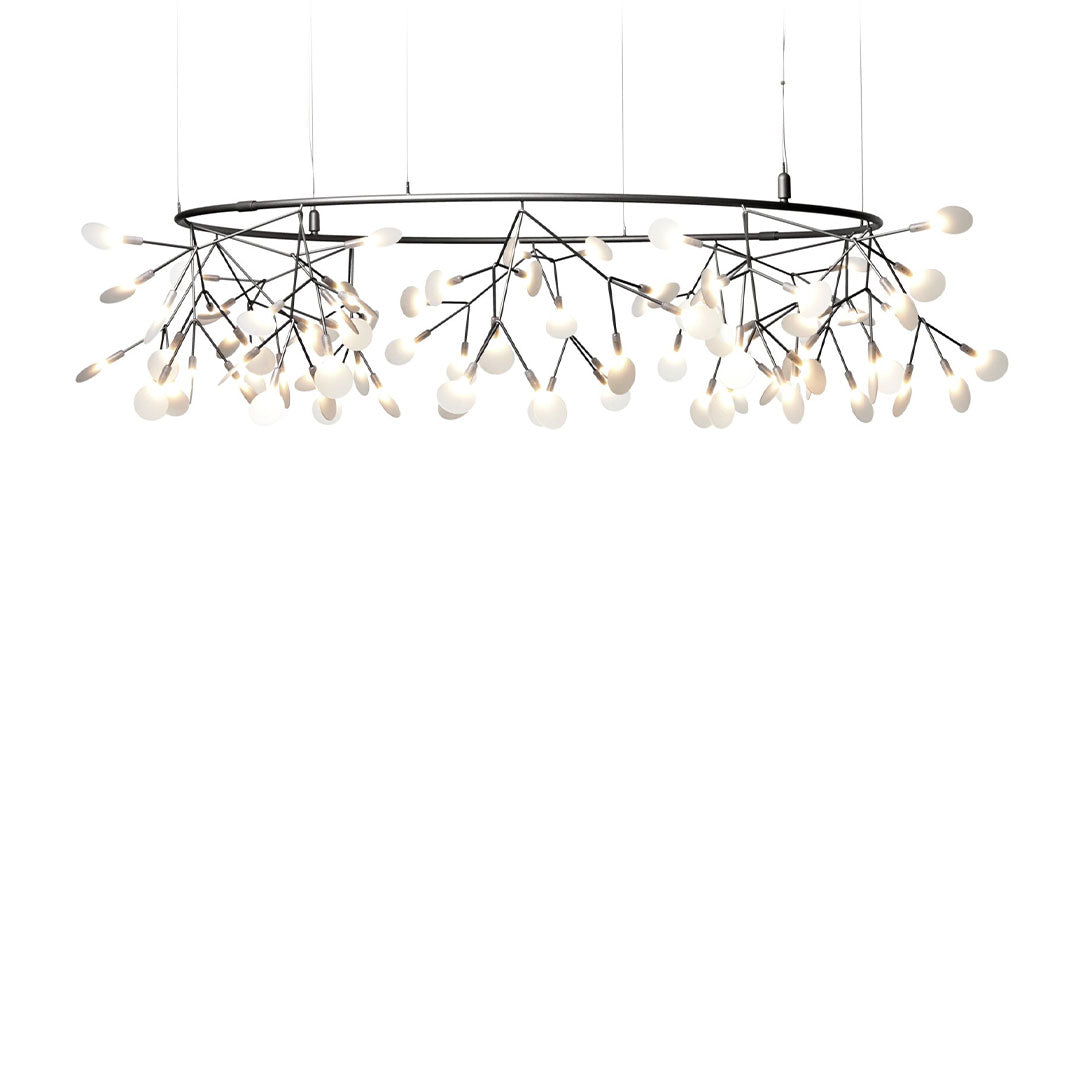 Modern chandelier with a black frame and delicate white glass accents, featuring a unique branch-like pattern.