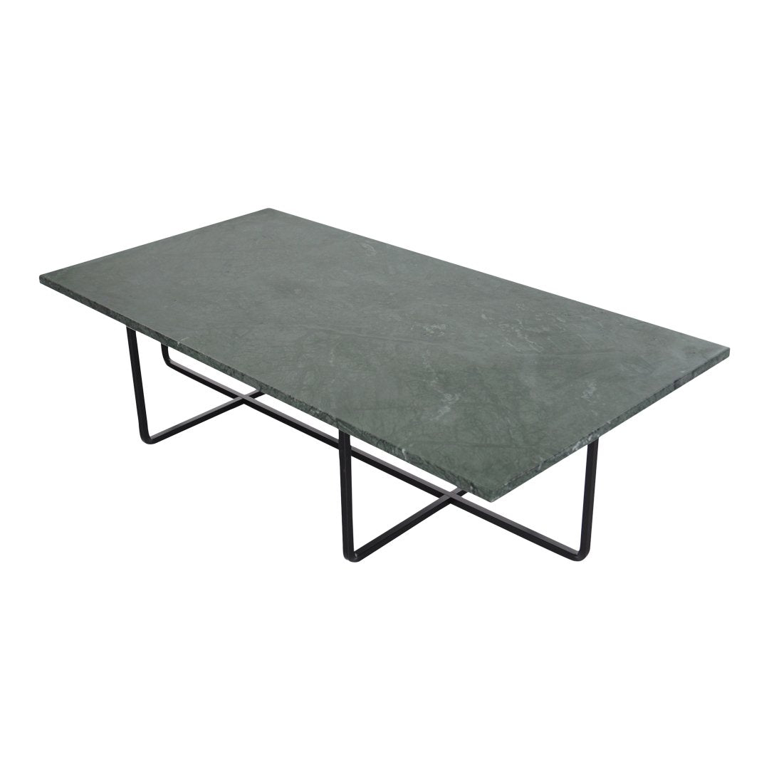 Green slate tabletop with a smooth finish, supported by a sleek black metal frame. Perfect for modern decor.