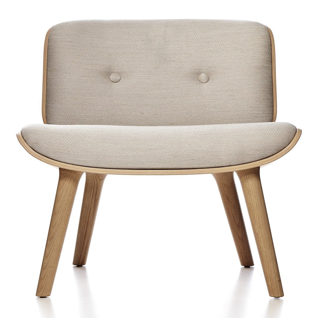 Light beige upholstered chair with subtle texture and natural wood legs, featuring a minimalist and modern design.