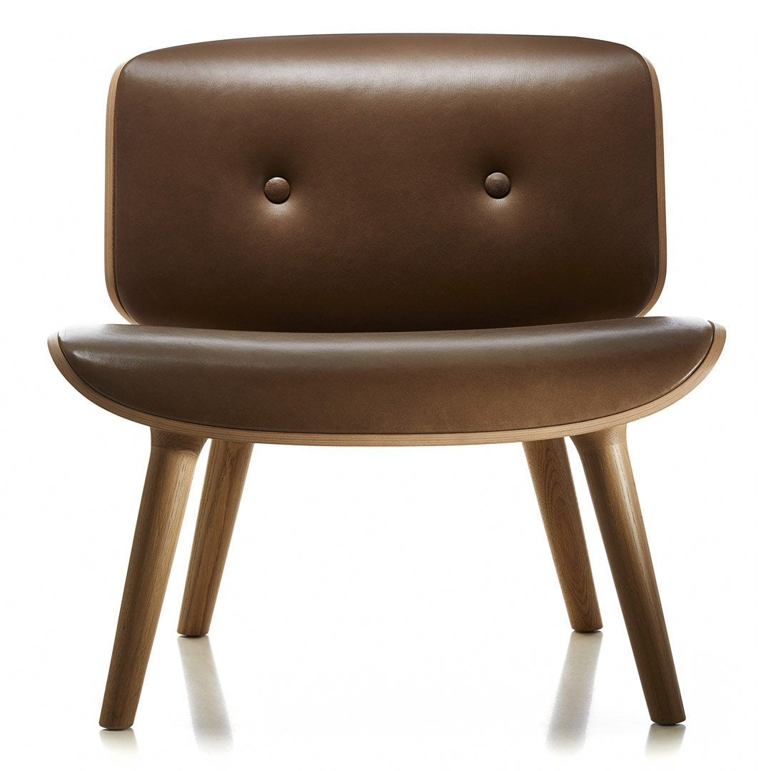 Brown leather accent chair with a smooth, curved design and two button details, featuring wooden legs.
