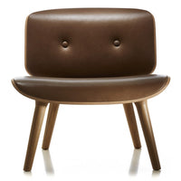 Brown leather accent chair with a smooth, curved design and two button details, featuring wooden legs.