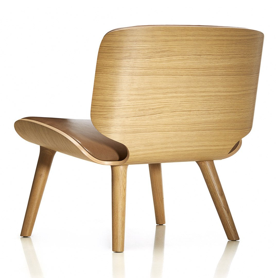 Natural wood chair with smooth, light oak finish and minimalist design. Perfect for modern decor.