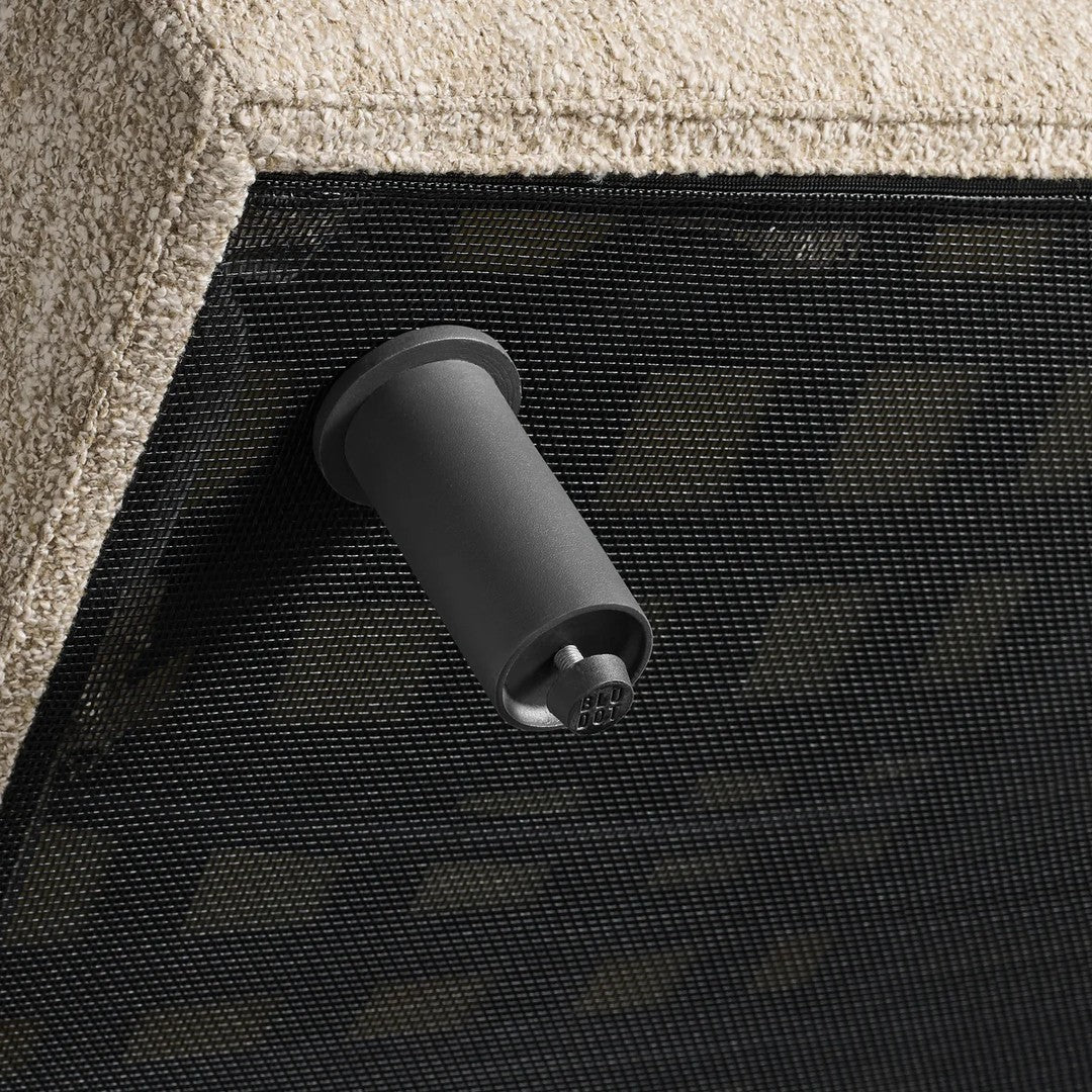 Black and beige contrast with a textured pattern, showcasing a sleek architectural design element.