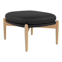 Black padded ottoman with natural wood legs, featuring a sleek, minimalist design. Perfect for modern decor.