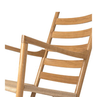 Light oak wooden chair with a modern slatted design and natural finish, showcasing warm beige tones and clean lines.