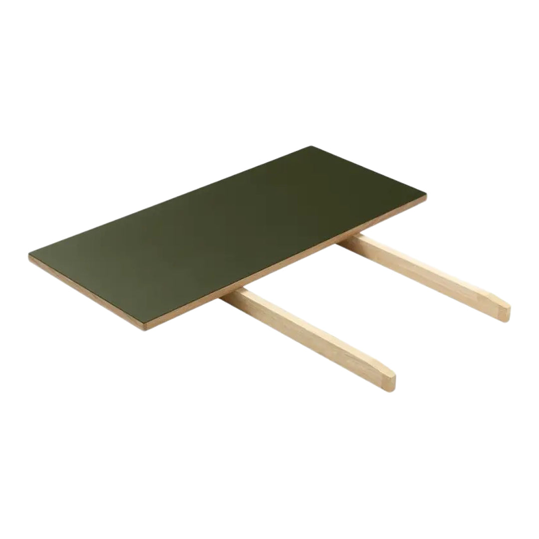 Dark green tabletop with natural wood legs, minimalist design, perfect for modern decor.