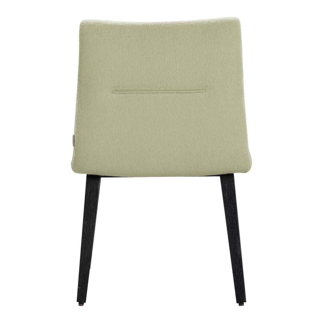 Back view of a light green upholstered chair with black wooden legs, featuring a simple, sleek design.