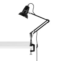 Black adjustable desk lamp with sleek metallic accents and a minimalist design, perfect for modern workspaces.
