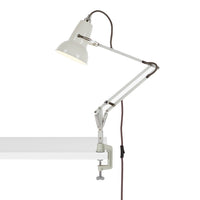 White adjustable desk lamp with a sleek, minimalist design and a brown cord, perfect for modern decor.