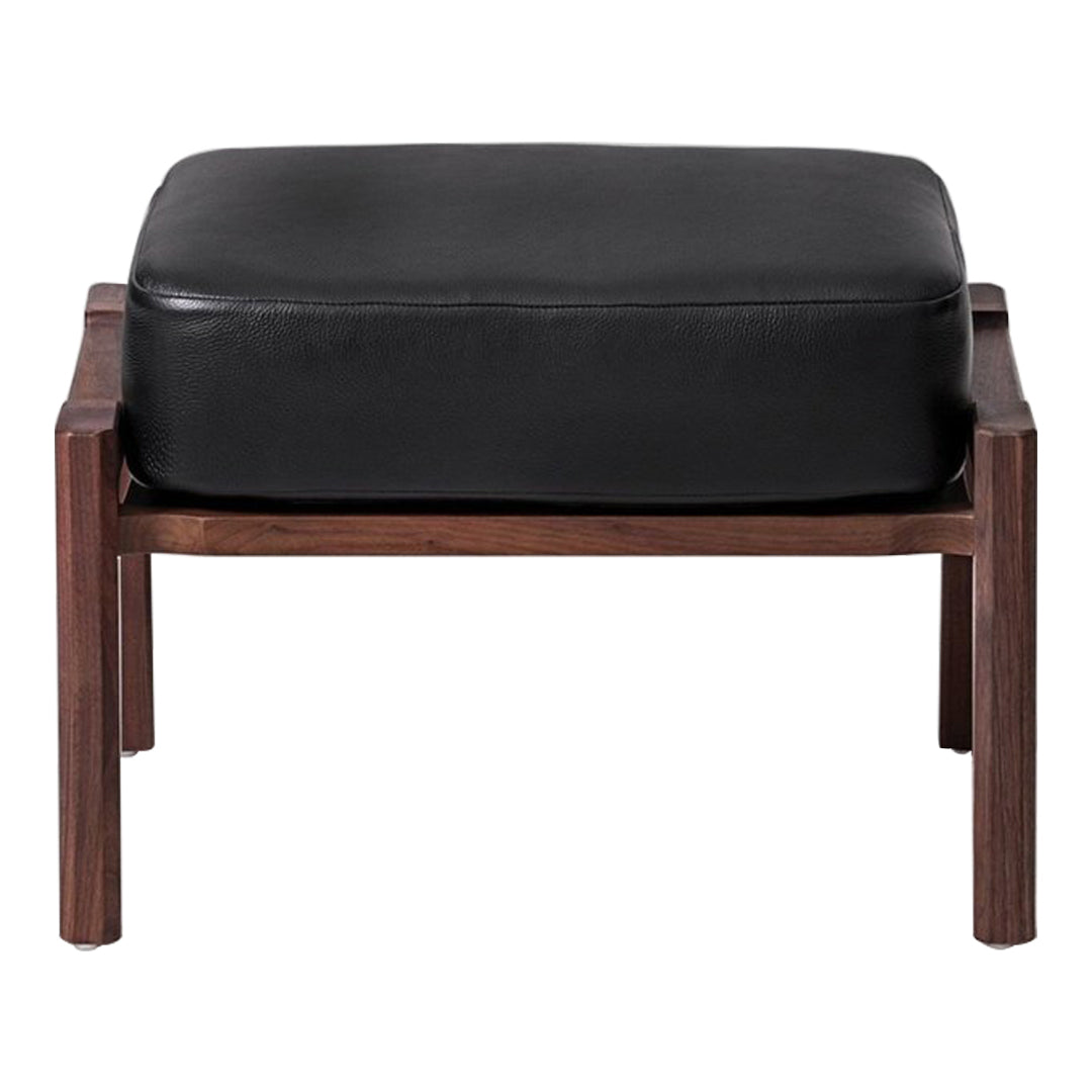 Black leather ottoman with a simple, modern wooden frame in a dark finish. Stylish, minimalist design.