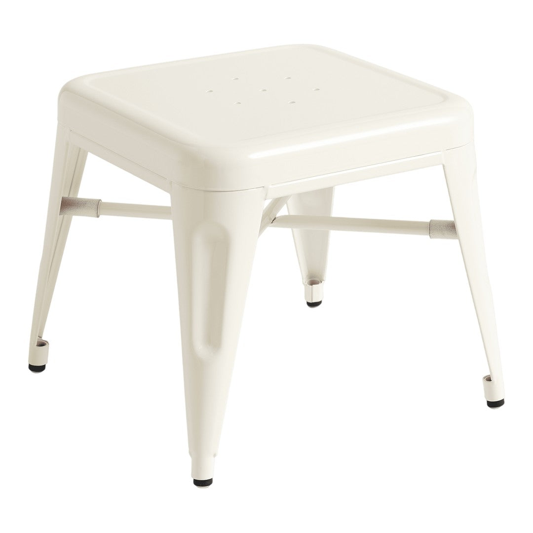 White metal stool with a minimalist design, featuring a smooth finish and round perforations on the seat.