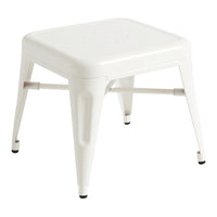 White metal stool with a sleek, minimalist design and a smooth, solid finish. Perfect for modern decor.
