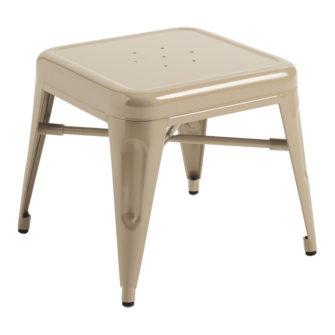 Beige metal stool with a smooth, glossy finish and classic perforated top design. Ideal for modern decor.