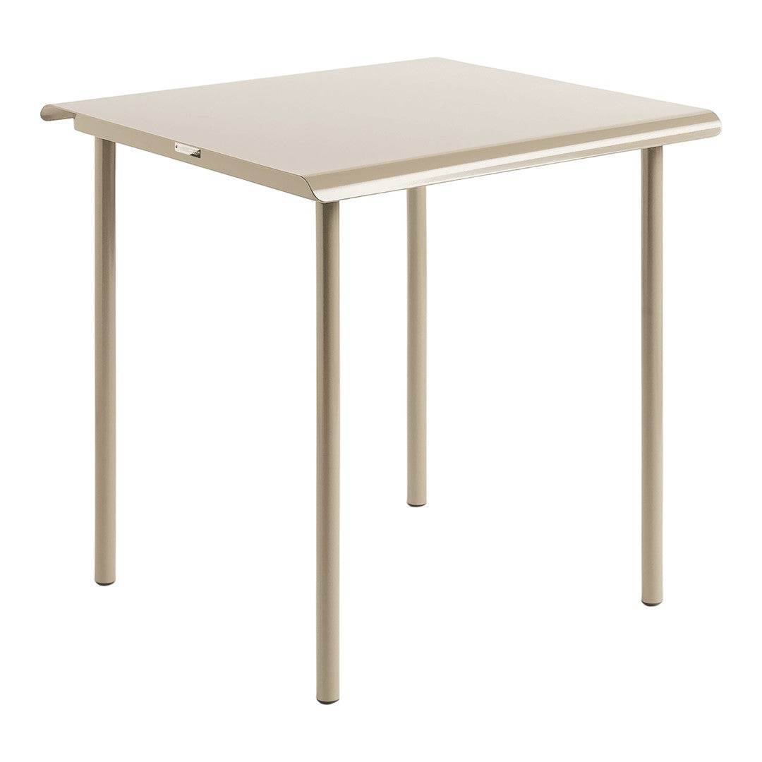 Square dining table in soft beige with a smooth, matte finish and sleek metal legs. Ideal for minimalist decor.