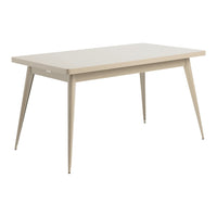 Modern beige dining table with sleek legs, ideal for minimalist decor and versatile styles.