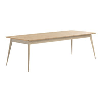Light oak wood table with a smooth finish and natural grain pattern, featuring sleek, tapered legs in a neutral tone.
