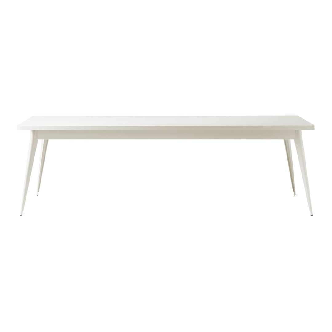 "Minimalist white dining table with sleek, tapered legs and a smooth surface, perfect for modern decor."