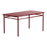 Red rectangular table with a smooth surface and sleek metal frame, perfect for modern decor.