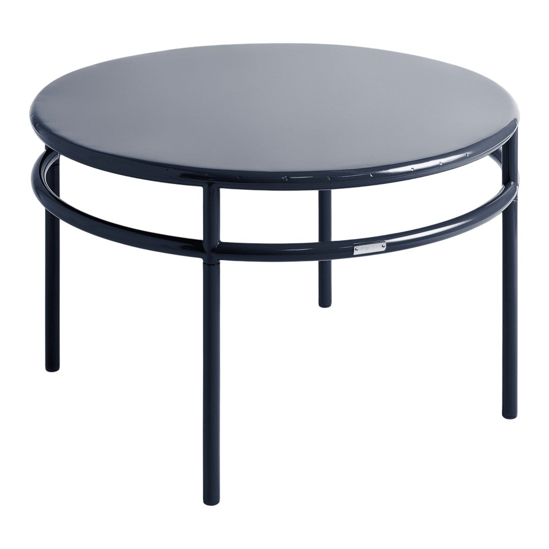 Round navy blue coffee table with a sleek, minimalistic design and matte finish. Elegant and modern for any decor.