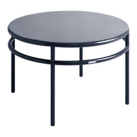 Round navy blue coffee table with a sleek, minimalistic design and matte finish. Elegant and modern for any decor.