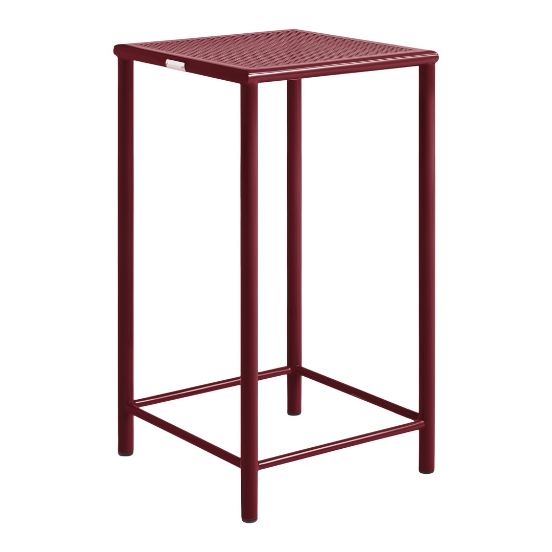 Rust-colored bar stool with a textured surface and sleek metal frame, perfect for modern decor.