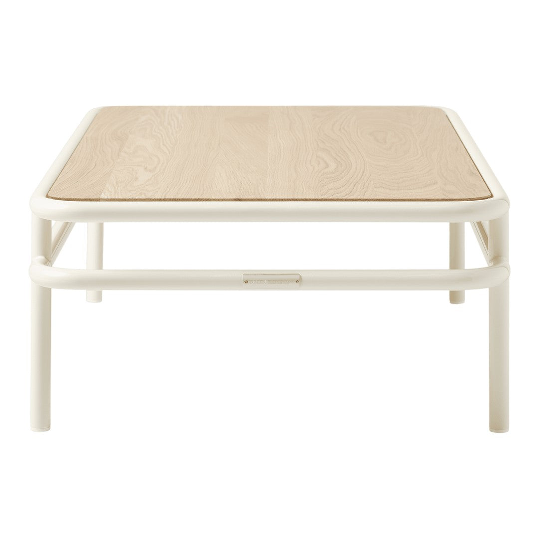 Square coffee table with a light wood top and a white frame, showcasing a minimalist, modern design.