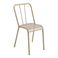 Beige metal chair with a minimalist design and perforated seat, ideal for modern interiors.