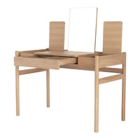 Light wood vanity desk with a minimalist design, featuring smooth surfaces and no visible patterns.